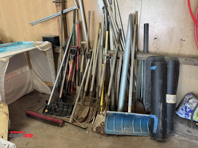 Lot 1-14205 - Large lot of assorted shovels, pitch forks, spade and square shovels, snow shovel, mauls, axes, and ...