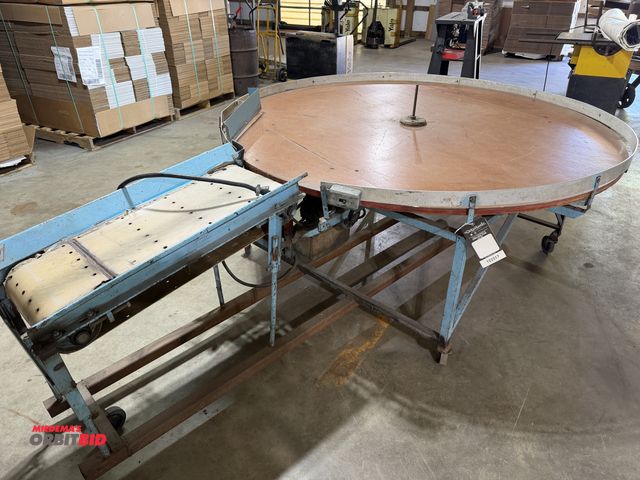 Lot 1-102517 - (1) Electric round table, approx. 6' with 32" in feed conveyor