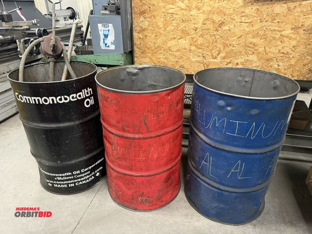 Lot 1-2010 - Lot including (3) empty 55-gallon steel drums with (1) manual drum pump.