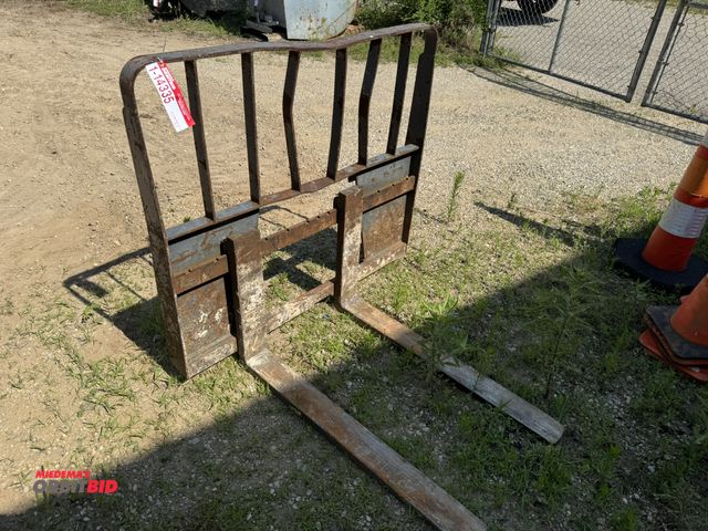 Lot 1-14335 - (1) set of skid steer quick attach forks, 36" x 4", Delayed removal, please contact auction manager ...