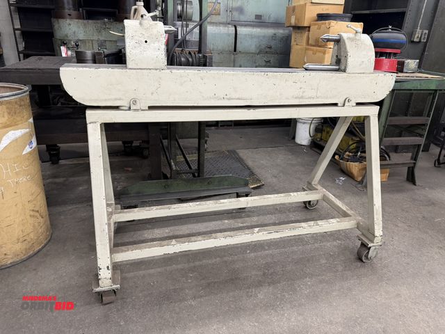 Lot 1-1834 - (1) Sundstrand bench center with approx. 54" max. piece area, and a 58" width x 34" height x 30" dep...