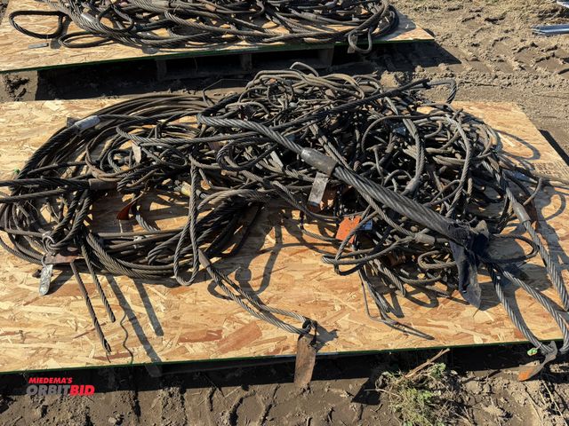 Lot 1-2965 - Large lot of assorted steel lift straps, steel chokers (various sizes and lengths).