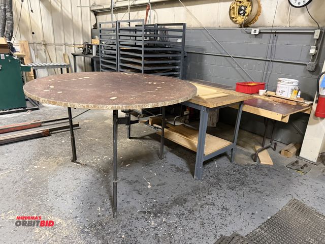 Lot 1-18652 - Lot of 3 tables, includes (1) 60" round rotating top table, wood top and metal frame, (1) metal fram...