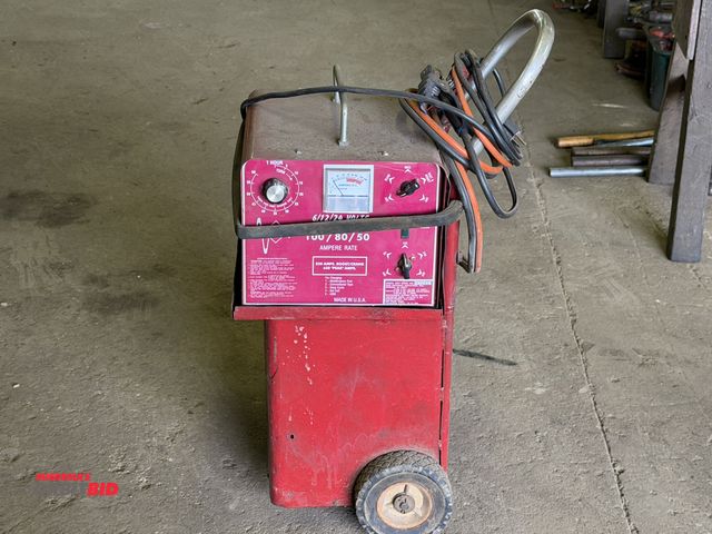 Lot 1-18153 - (1) RN, model 52PY 6/12/24V battery charger-100/80/50 amp, S/N 7241, includes jumper cables, working...