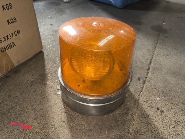 Lot 1-1256 - (1) approx. 7" diameter x 9" tall 12V amber strobe light, working condition unknown, untested.