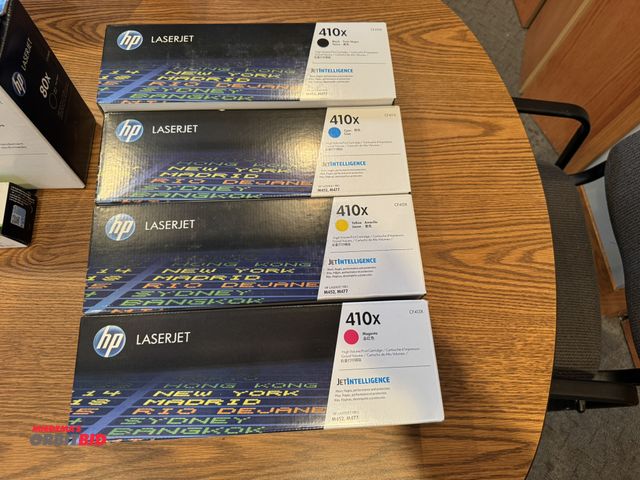 Lot 1-19588 - Lot of (4) Hewlett Packard 410X laser jet ink cartridges, includes black, cyan, yellow, and magenta.