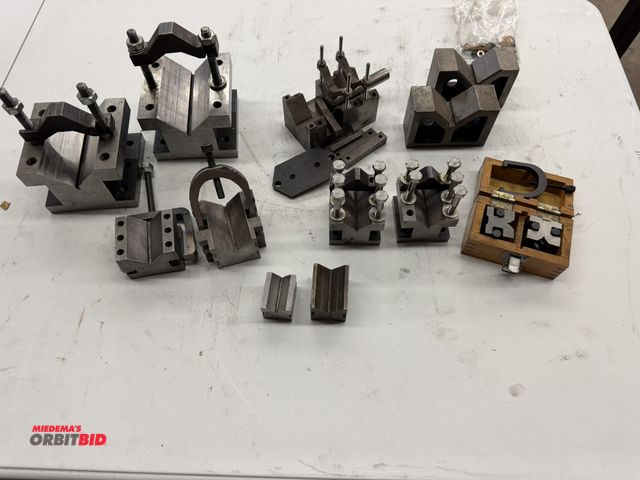 Lot 1-6109 - Large lot of assorted V-blocks and hardware.