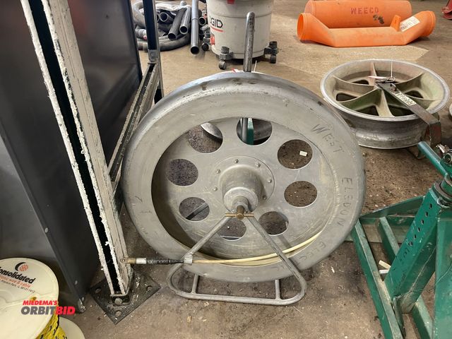 Lot 1-6222 - (1) steel fish tape reel, unknown length.