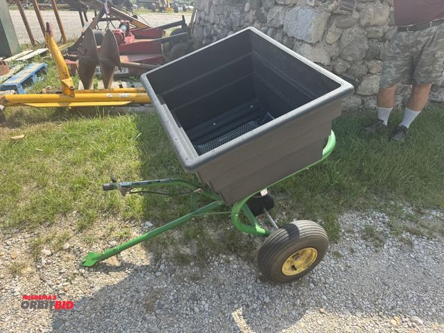 Lot 1-7025 - (1) John Deere Fertilizer Spreader, model TY25012, pin hitch, pneumatic tires.