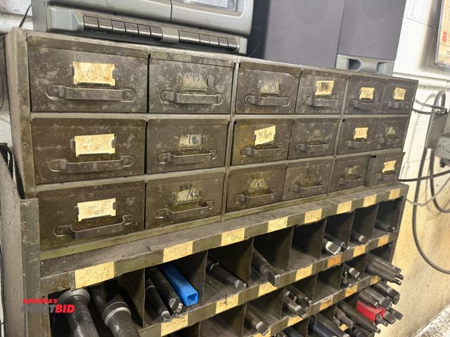 Lot 1-6388 - (1) 18-drawer metal parts bin pull out cabinet, with assorted drills, includes 7/32", 9/16", 5/8", 9...