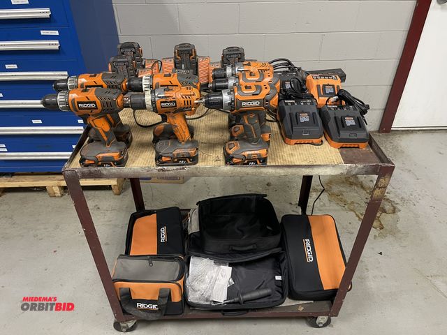 Lot 1-19324 - Large lot of Ridgid 18V power tools, includes (5) Ridgid 1/2" drills, (1) impact, (13) batteries, as...