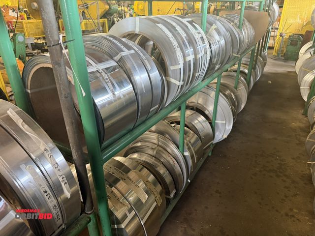 Lot 1-18759 - (1) 96" length x 63" height x 16" depth 3-tier tube steel rack with assorted aluminum rolls, most ro...