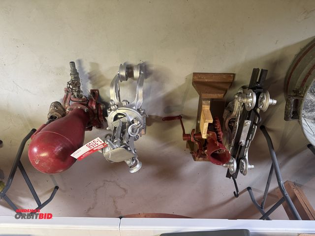Lot 1-3158 - Lot of hand corn sheller, water Ram pump, (2) trollys, and tin bucket.