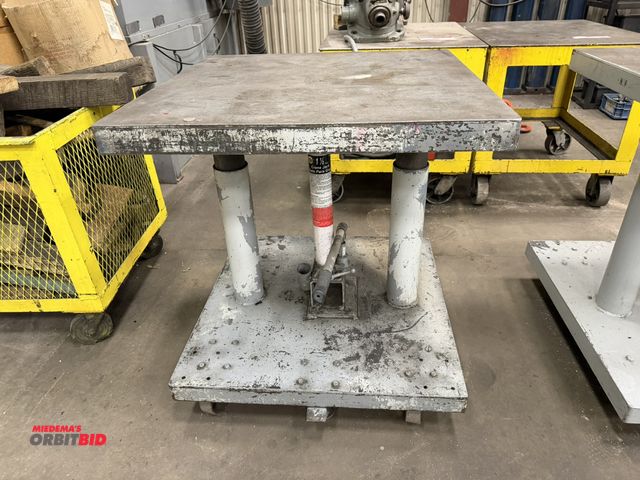 Lot 1-15388 - (1) 1.5-ton hydraulic rolling lift table, heavy duty steel top, 30" x 30".