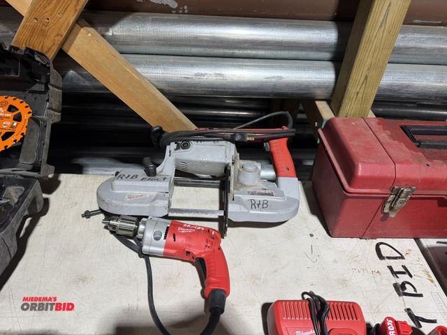 Lot 1-4199 - Lot of Milwaukee tools, includes (1) heavy duty deep cut bandsaw, and (1) 1/2" Magnum hole shooter, ...