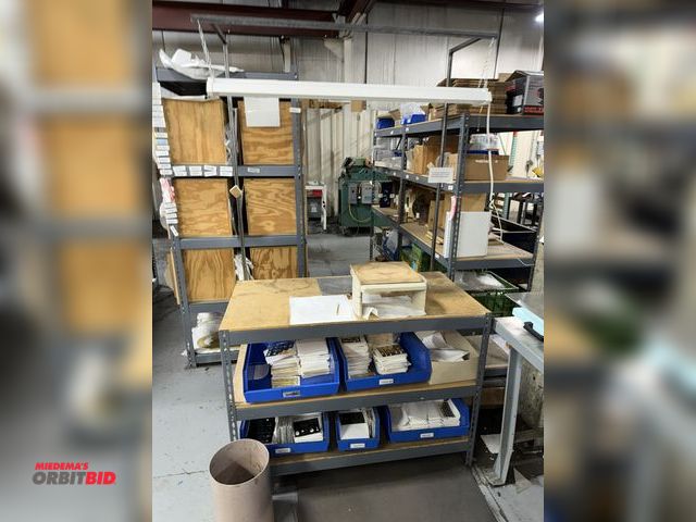 Lot 1-18885 - (1) adjustable 48" metal shelving unit/table, LED 2-bulb light, with contents.