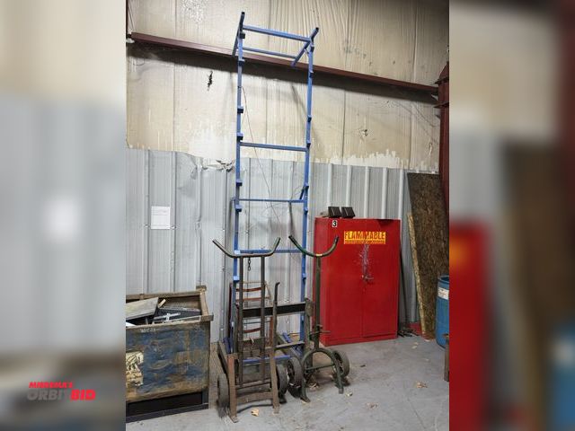 Lot 1-18790 - Lot of (2) 2-wheel barrel carts, (1) 55-gallon drum dolley, and 5-place 55-gallon drum barrel stand,...