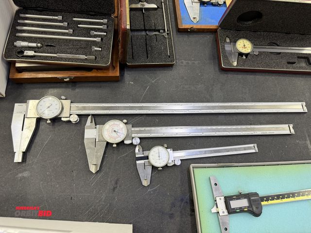 Lot 1-10290 - (1) 6" dial caliper, (1) Fowler 12" dial caliper, and (1) 18" dial caliper.