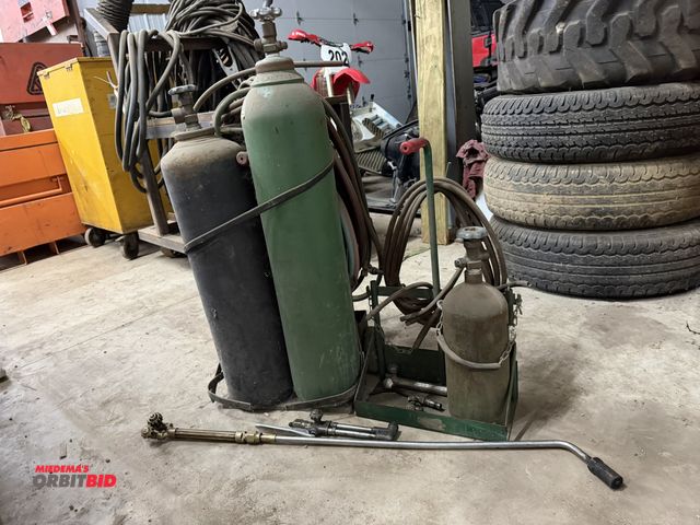 Lot 1-1465 - (1) oxygen/acetylene tank cart with hose, tanks, and mini torch kit with its own hose, carrier, torc...