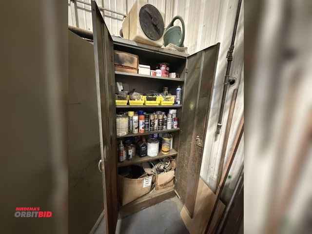 Lot 1-18564 - (1) 2-door metal storage cabinet with contents, includes assorted spray paints, oils, wood finishes,...