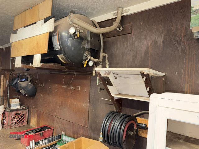 Lot 1-12136 - (1) Craftsman approx. 60 gallon, wall mount air tank with manual air hose reel, winning bidder respo...