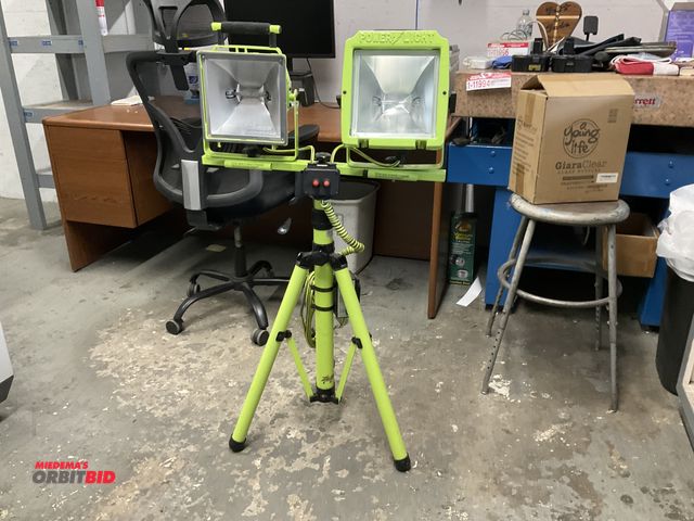 Lot 1-11999 - Power Light, dual bulb halogen work light with adjustable tripod stand. (Left hand light is missing ...