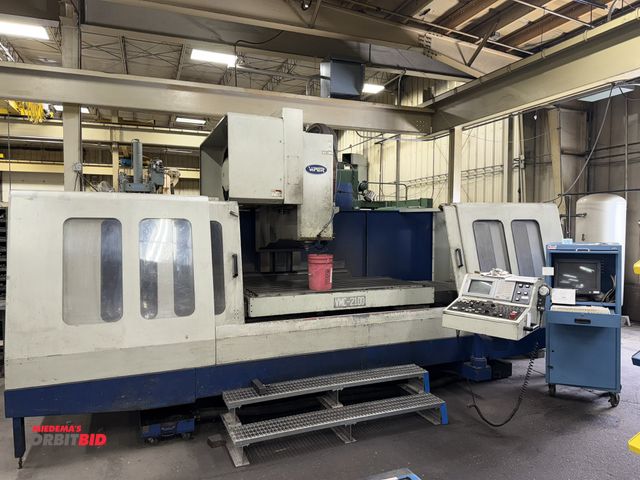 Lot 1-963 - (1) Viper model VMC-2100 CNC vertical machining center with Mitsabishui 530 CNC control, 32 station ...
