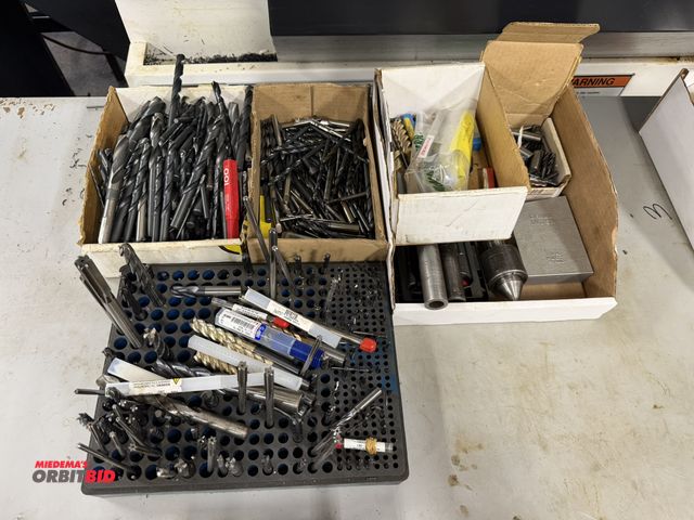 Lot 1-11078 - Lot of assorted tooling, includes various drill bits, reamers, end mills, (1) live center, and misce...