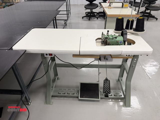 Lot 1-4870 - (1) Merrow, model MG-3DW-2, over seaming sewing machine, S/N 309139, includes power table, foot peda...