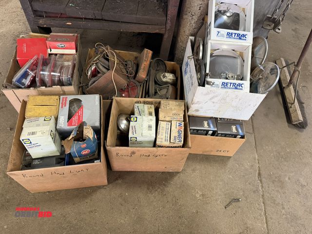 Lot 1-18578 - Lot of assorted truck and trailer lights, includes tail lights, headlights, truck mirrors, and more.