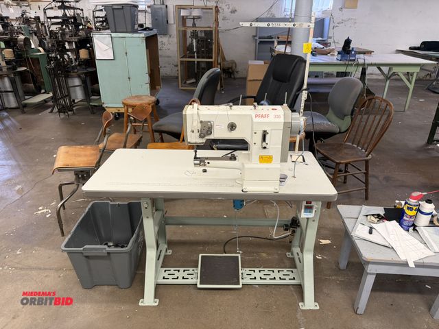 Lot 1-4728 - (1) PFAFF 335, single needle sewing machine with power table, 47.5" x 21" deep x 29.5" tall and spoo...