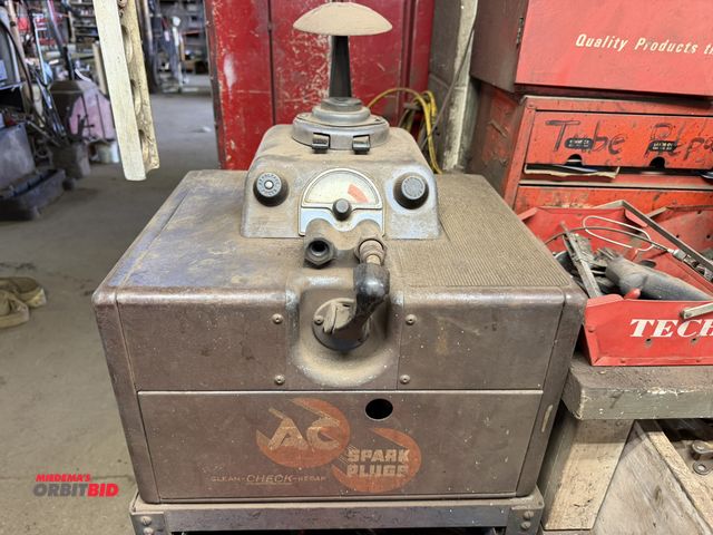 Lot 1-18566 - (1) vintage AC Spark Plug cleaner/tester with metal stand and pull out drawer, in working condition.