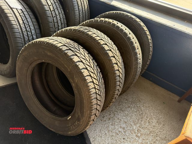 Lot 1-1299 - Set of (4) new Goodyear Ultra GR/P, size 205/65R15, winter tires.