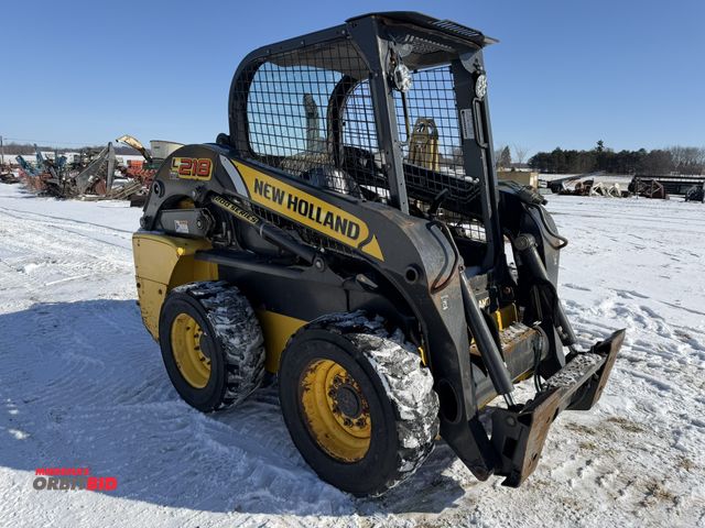Lot 1-11756 - (1) New Holland L218 skid steer, S/N NGM4174932, Product ID #JAF0L218EGM417492, 10-16.5 tires, open ...