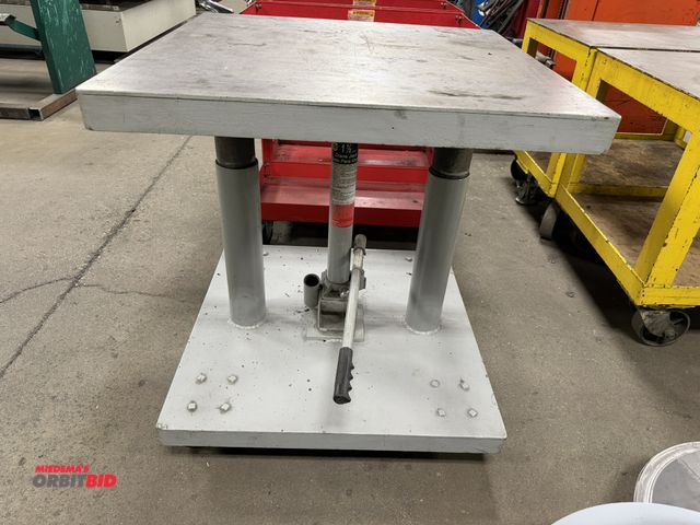 Lot 1-15323 - (1) Omega 1.5-ton hydraulic lift table, 30" x 30" heavy duty steel top.