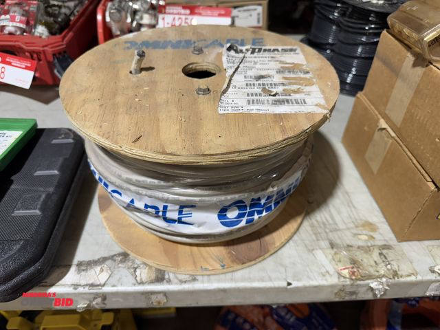 Lot 1-4260 - (1) 250' spool of Omni cable, 8-gauge, 1 conductor L4KS24194, 600V, gray.