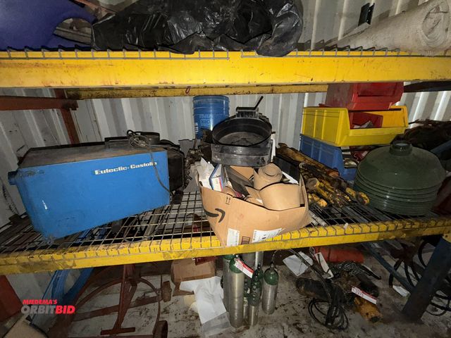 Lot 1-2977 - Contents of shelf in container, includes (7) heavy duty hydraulic cylinders, (1) Eutectic Castolin f...