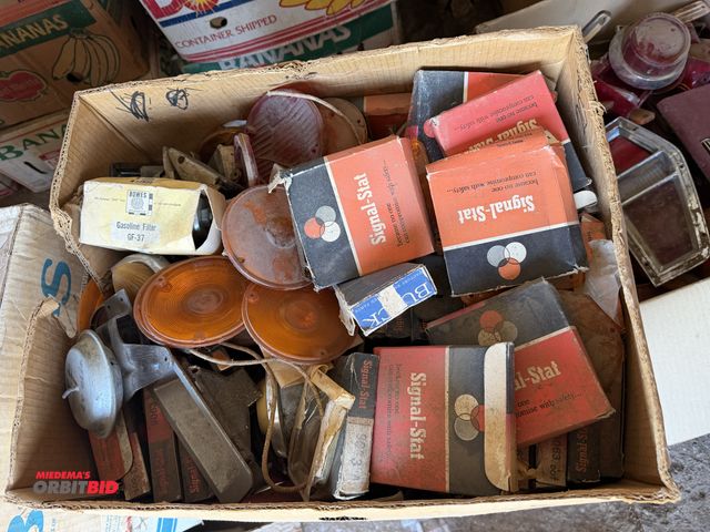Lot 1-8589 - Large lot of assorted vintage car parts, includes Buick, Oldsmobile, and much more.