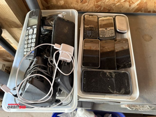 Lot 1-8343 - Lot of vintage phones, phone cables, and miscellaneous other items.