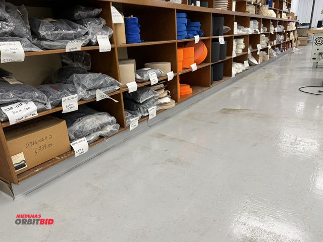 Lot 1-4899 - Contents of bottom shelf with assorted sewing items, includes elastic binding, 4" beige elastic, 1.5...