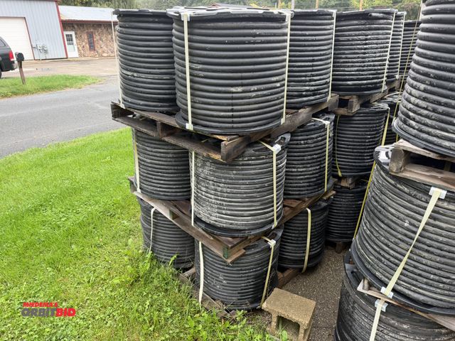Lot 1-18752 - (3) skids/(12) spools of 1" heavy duty rubber hose, 1" OD with 1/4" wall, approx. 5/8" center diamet...