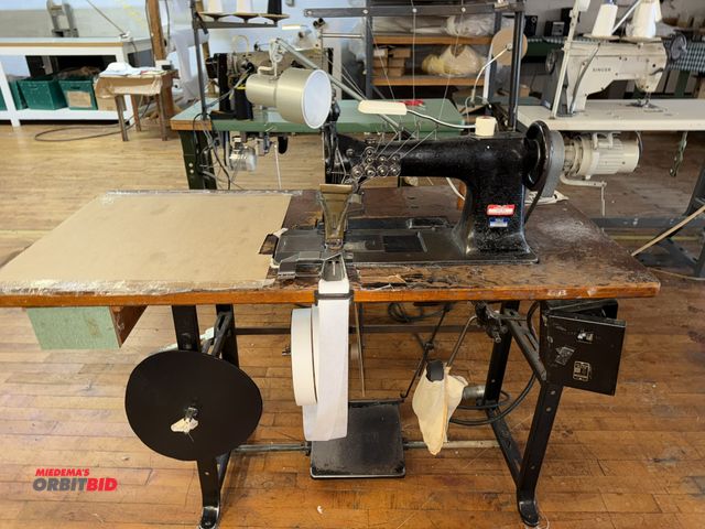 Lot 1-4685 - (1) Singer, model 112, commercial sewing machine mounted on a Singer power table, 1/2 HP, 3 phase mo...