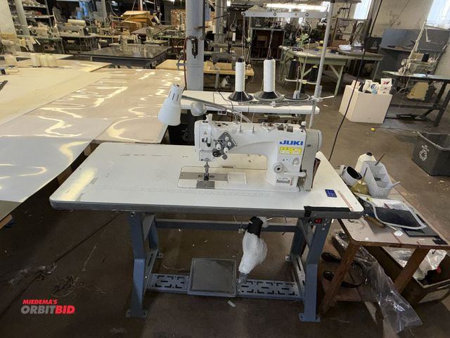 Lot 1-4733 - (1) Juki LH-3578A, 2-needle sewing machine with power table, 47.5" x 21.5" x 29.5" tall, spool rack,...