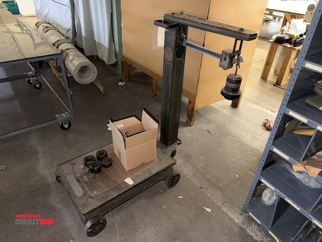 Lot 1-4837 - (1) Fairbanks antique platform scale with weights, platform scale is 18" wide x 27" long, appears sc...