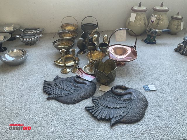 Lot 1-17204 - Lot of assorted metallic home decor items.