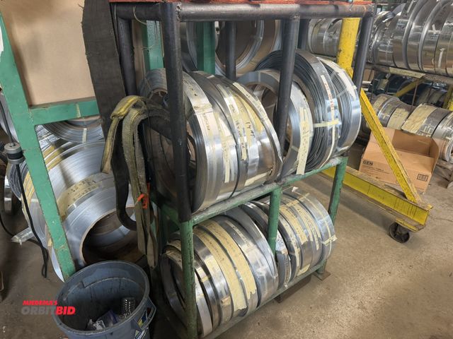 Lot 1-18679 - (1) 40" width x 61.5" height x 16" depth, steel tube rack with contents of various rolls of aluminum...