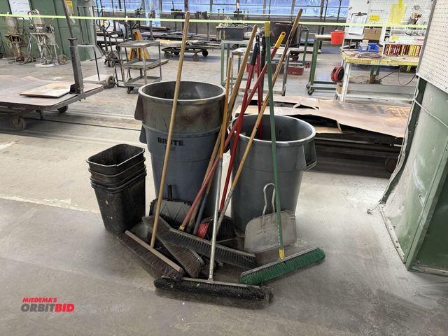 Lot 1-17214 - Lot of assorted push brooms, dust pans, waste baskets, and (3) Brute approx. 45 gallon capacity tras...
