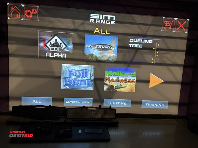 Lot 1-11299 - (1) Simulation shooting game with computer system, (2) KWC hand guns with cases, (2) model 870 super...