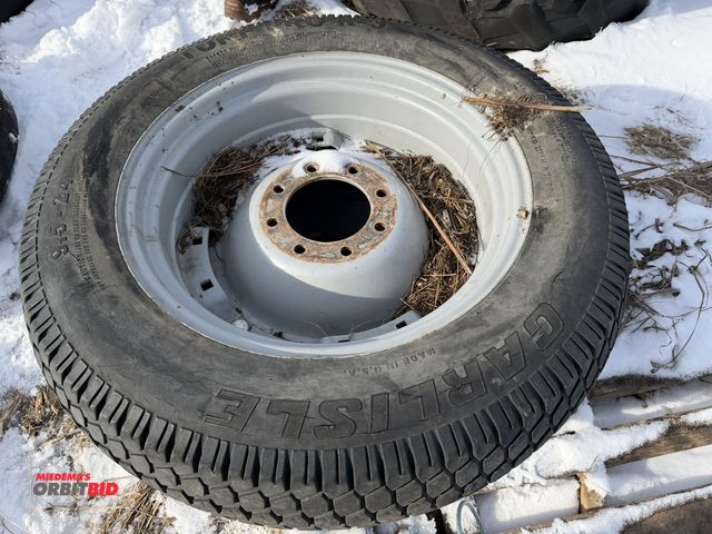 Lot 1-11624 - (1) set of Carlisle 9.5-24 Turf Pro R-3 tires mounted on 8-bolt rims, tires are weather checked.