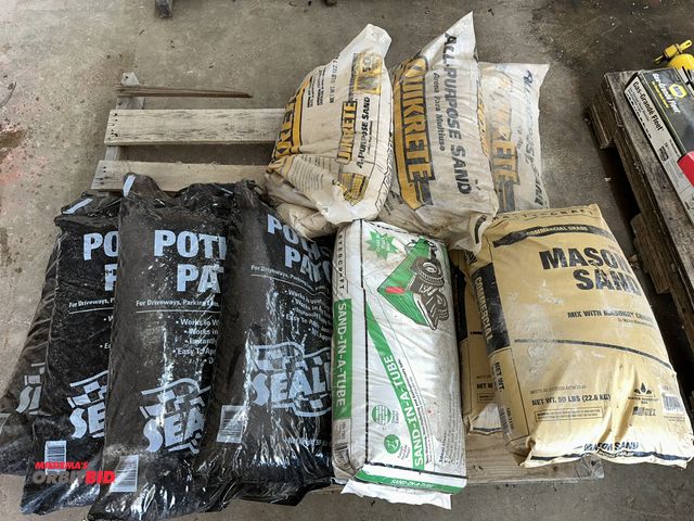 Lot 1-14127 - Lot including (3) 50 lb. bags of Pot Hole Patch, (1) 45 lb. bag of Sand-in-a-Tube, (2) 50 lb. bags o...